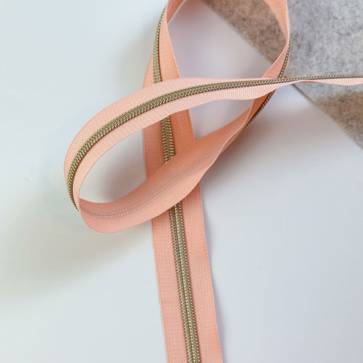Reißverschluss Endlos Frosted Peach Gold